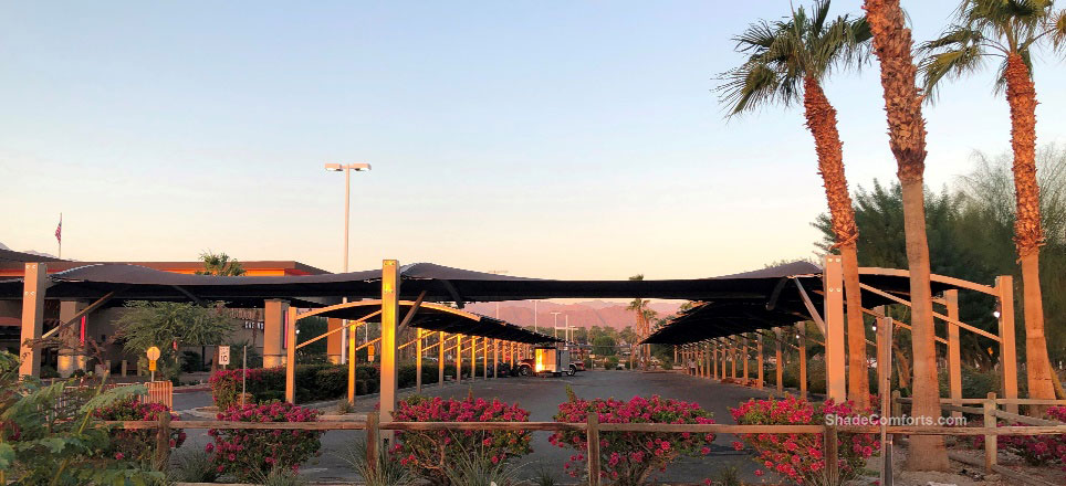 Cantilever parking shade canopy structures have arched beams at Inland Empire casino in Riverside County.