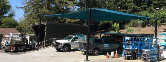 This truck parking shade structure has a super span roof of HDPE shade fabric.