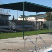 This fabric shade canopy cools the pool deck at a Placer County school.