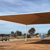 Fabric shade structures cover the target practice firing range at Camp Pendleton U.S. Marine Base near San Diego. Each of the 3 structures has a hip roof measuring 50’x40’ with a 14’ clearance height.