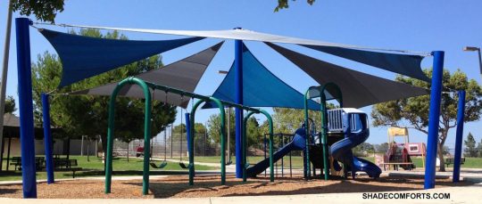 Outdoor play area shade sails structure creates a permanent sun protection canopy