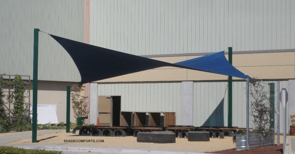 Two shade sails cover the storage bins at a San Francisco Bay recycling center.  Located in San Carlos, CA, South Bay Waste Management Authority (a.k.a. Rethink Waste) recycles materials for several San Mateo County communities.