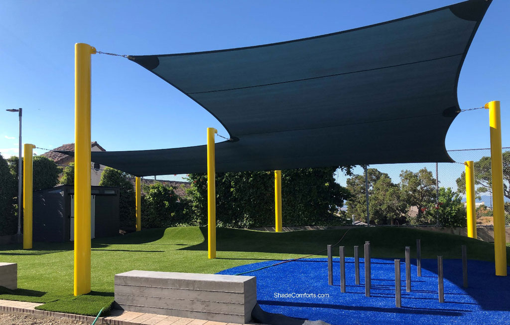 Shade sail contractor covers playground in Alameda County enclave of Oakland, CA.