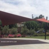 See photo of a tensile shade structure covering the hospitality patio at a San Jose vineyard. The fabric has hypar geometry