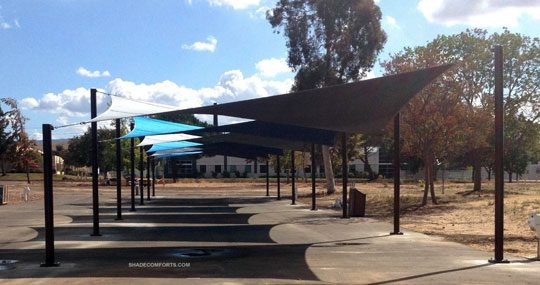 This tensile structure shades 4,950 square feet of patio space at a manufacturing company in the San Francisco Bay area. We were the design build contractor.