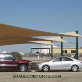 This tensile structure shades the parking lot at a manufacturing company in the San Francisco Bay area. Each of the three hypar shade sails is 36’x30’.