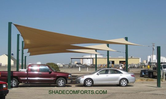 This tensile structure shades the parking lot at a manufacturing company in the San Francisco Bay area. Each of the three hypar shade sails is 36’x30’.